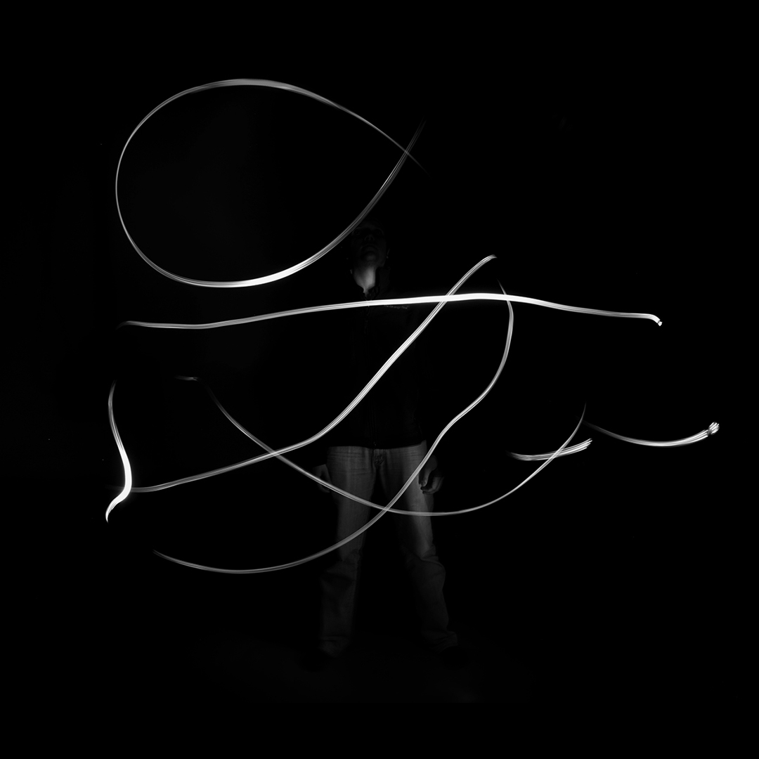 Artist portrait with light painting strokes